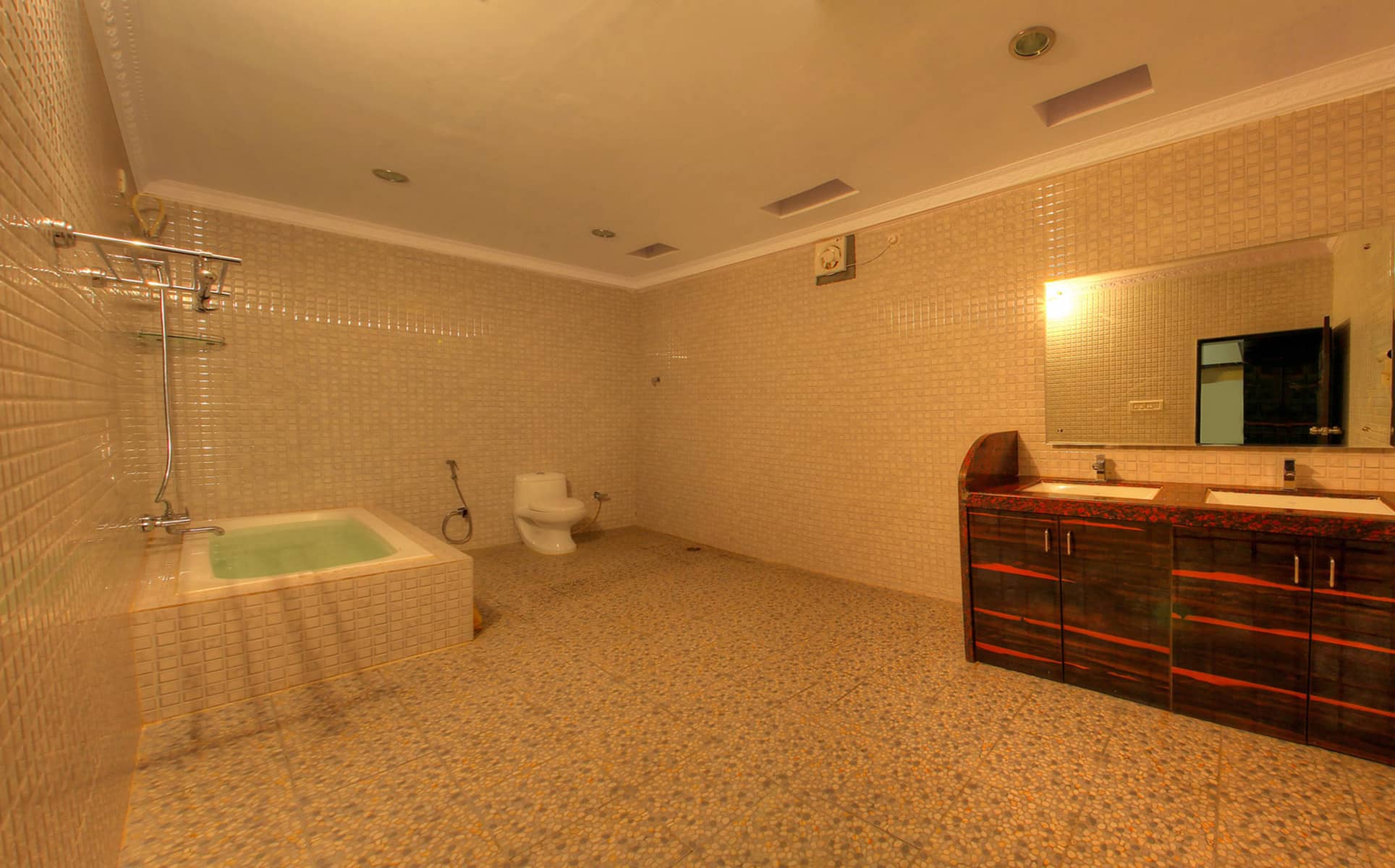 View of Ensuite Bathroom with Bathtub in MK Jungle Resorts Gundlupet